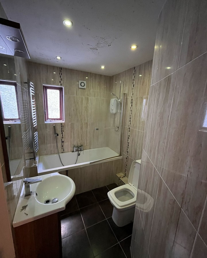 before bathroom image of bath sink and toilet